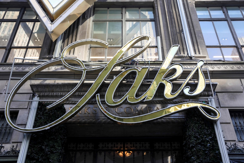 An exterior view of signage at the Saks Fifth Avenue department store in New York on January 13, 2026. (Photo by Angela Weiss / AFP)
 