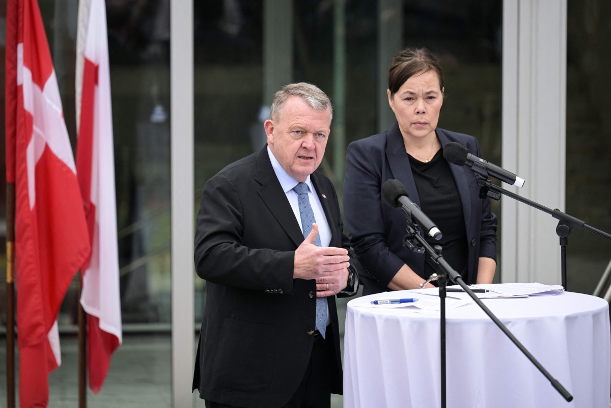 Danish Foreign Minister Lars Lّkke Rasmussen and Greenland's Foreign Minister Vivian Motzfeldt speak during a news conference at the Danish Embassy in Washington, DC, on January 14, 2026. (Photo by Oliver Contreras / AFP)