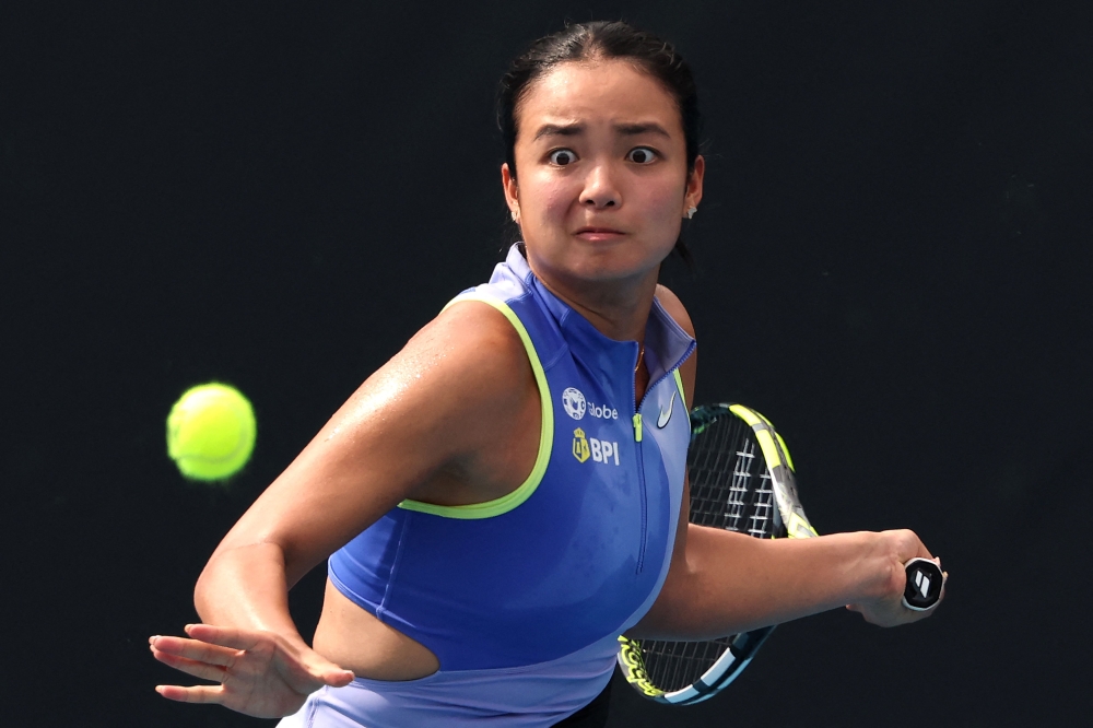Philippines’ Alexandra Eala hits a return to USA’s Alycia Parks during their women’s singles match against on day two of the Australian Open tennis tournament in Melbourne on January 19, 2026. (Photo by David Gray / AFP) 