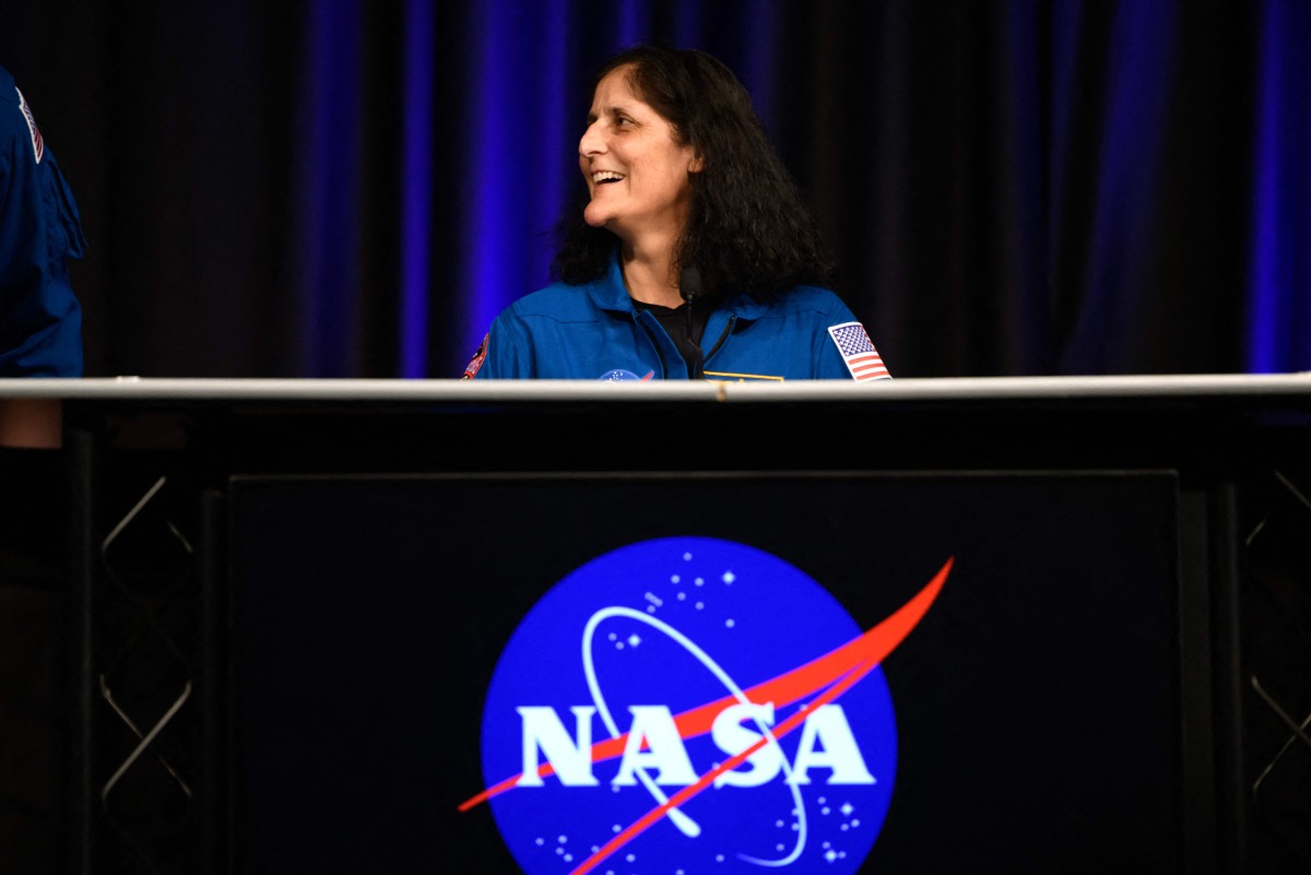 NASA astronaut Suni Williams laughs before NASA’s SpaceX Crew-9 post-flight news conference at the Johnson Space Center in Houston, Texas, on March 31, 2025. Photo by Mark Felix / AFP