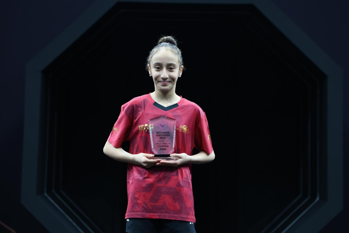 Qatar’s Racha Loghraibi poses with her trophy.