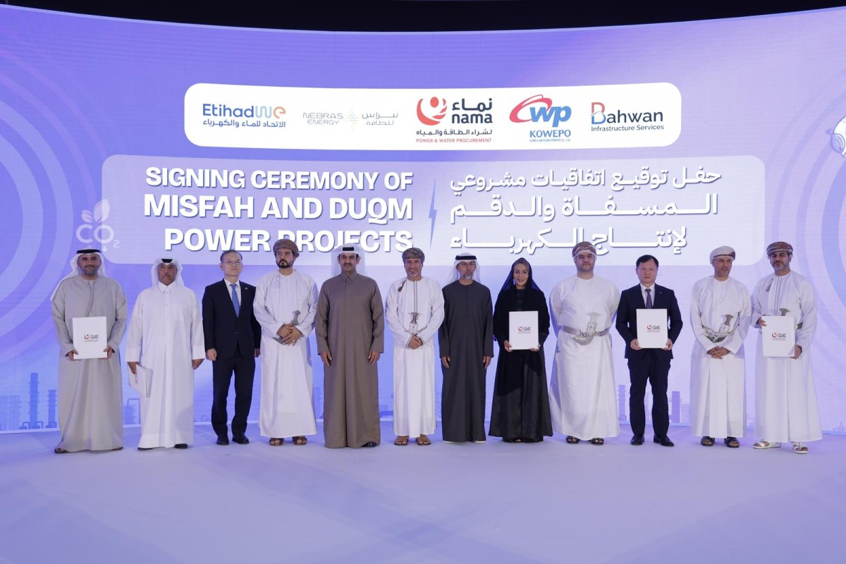Minister of State for Energy Affairs, H E Engineer Saad bin Sherida Al Kaabi and Managing Director and CEO of Nebras Energy, Engineer Mohammed bin Nasser Al Hajri with other officials.