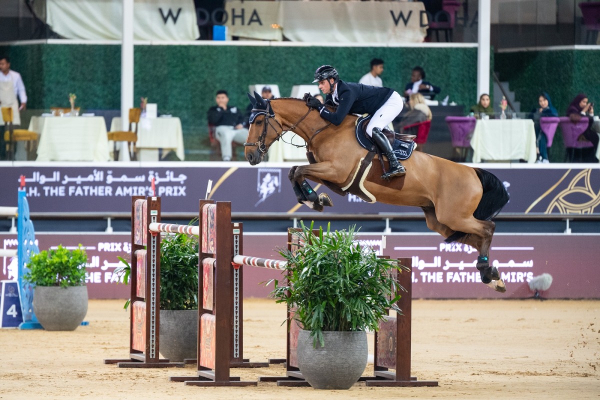 Germany's Christopher Klasener onboard Popeye Vd Bisschop clears a rail in the CSI5* 155cm jump-Off during the the third round of the HH The Father Amir's Prix at Al Shaqab.