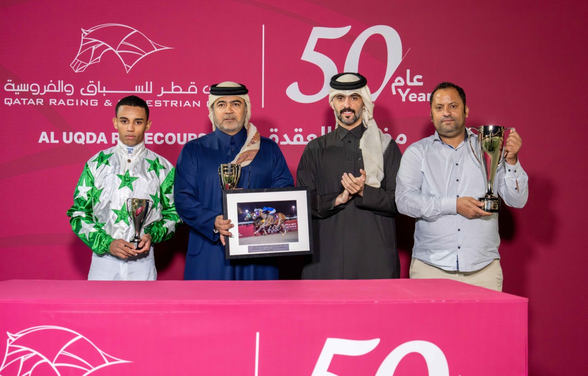 Head of QREC Racing Operations Section Rashid Saed Adiba presented the trophies to the winners Lehwaila Cup. PICS: JUHAIM/QREC