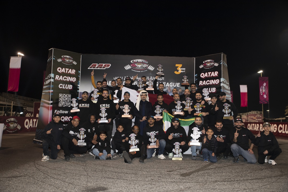 QRC Director General Sheikh Jabor bin Khalid Al Thani poses with the podium winners. 