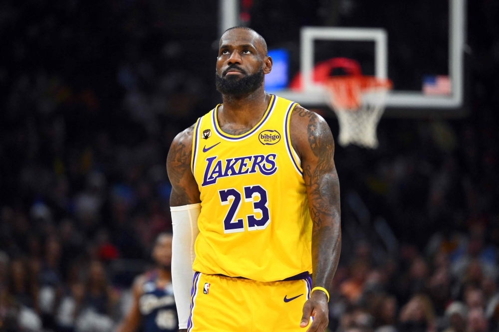 LeBron James #23 of the Los Angeles Lakers reacts during the fourth quarter against the Cleveland Cavaliers at Rocket Arena on January 28, 2026 in Cleveland, Ohio. Jason Miller/Getty Images/AFP 