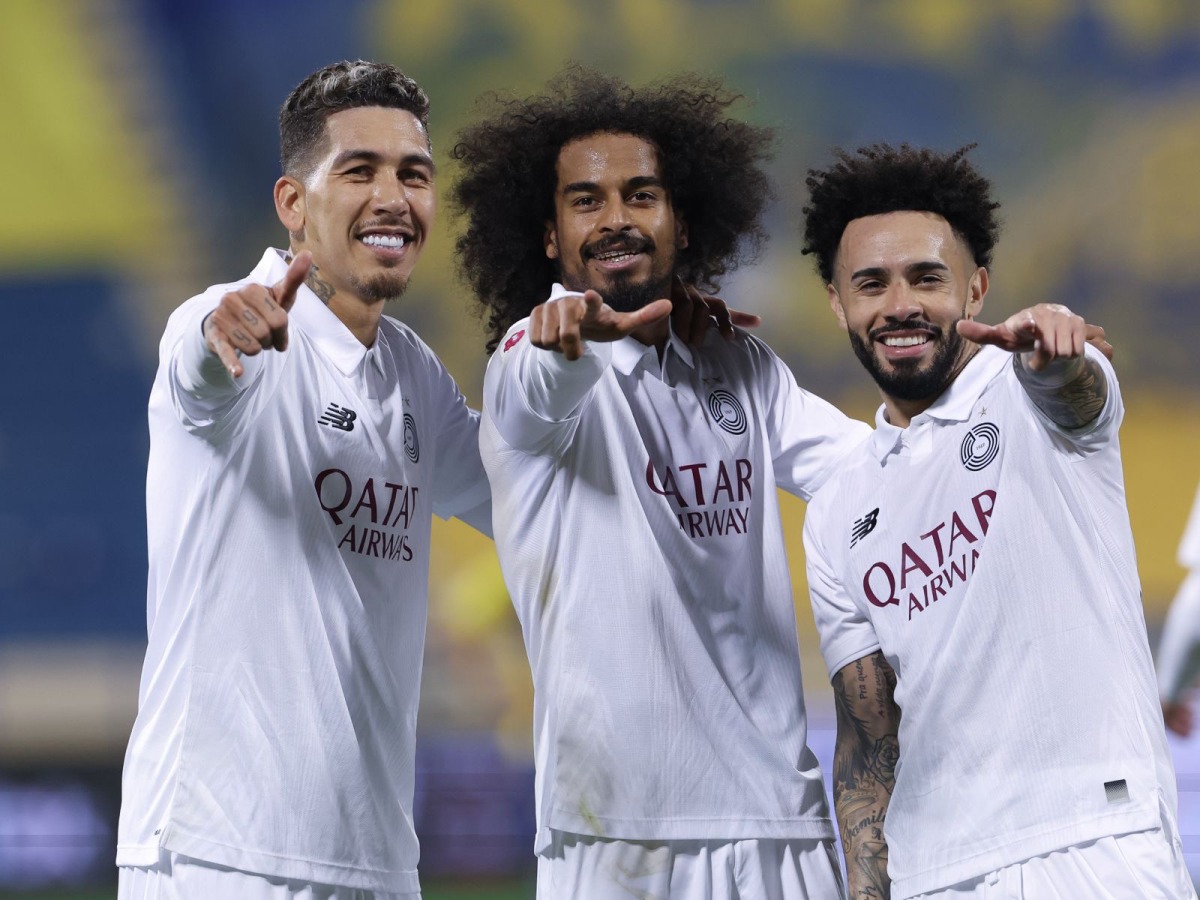 From left: Al Sadd's Roberto Firmino, Akram Afif and Claudinho celebrate after the win.