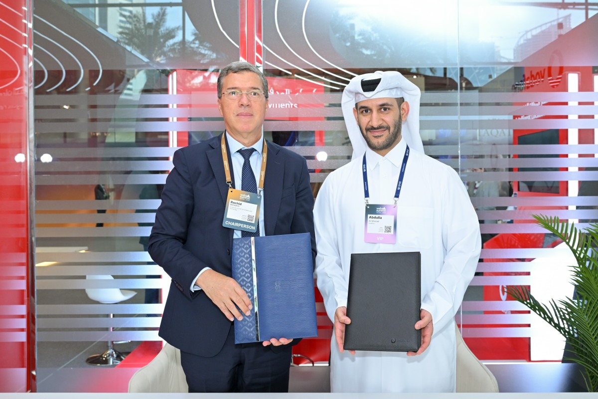 Chief Administrative Officer at Vodafone Qatar Abdulla Ali AlMisnad and Vice President, Academics at UDST Dr. Rachid Benlamri during the MoU signing ceremony at Web Summit Qatar 2026.