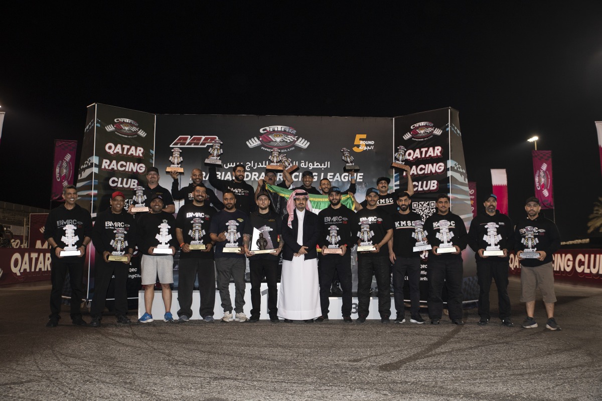 QRC Director General Sheikh Jabor bin Khalid Al Thani with the podium winners of the fifth round. 
