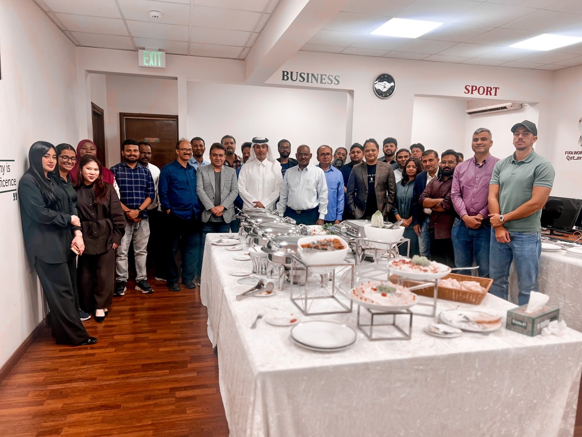 The Peninsula Editor-in-Chief Prof. Khalid Mubarak Al-Shafi with staff members from different departments during the celebration.