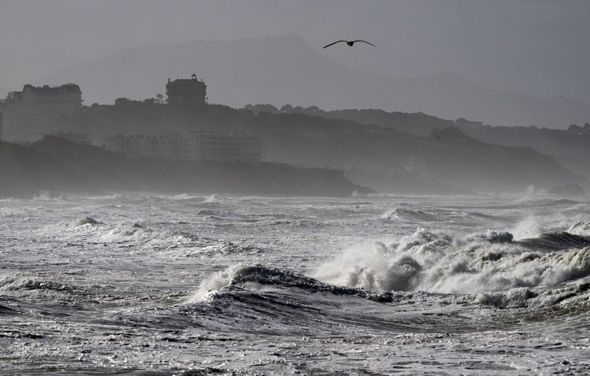 Waves crash near the Plage des Basques in Biarritz, as the storm named Nils hits southwestern France coastline on February 12, 2026. (Photo by Gaizka IROZ / AFP)