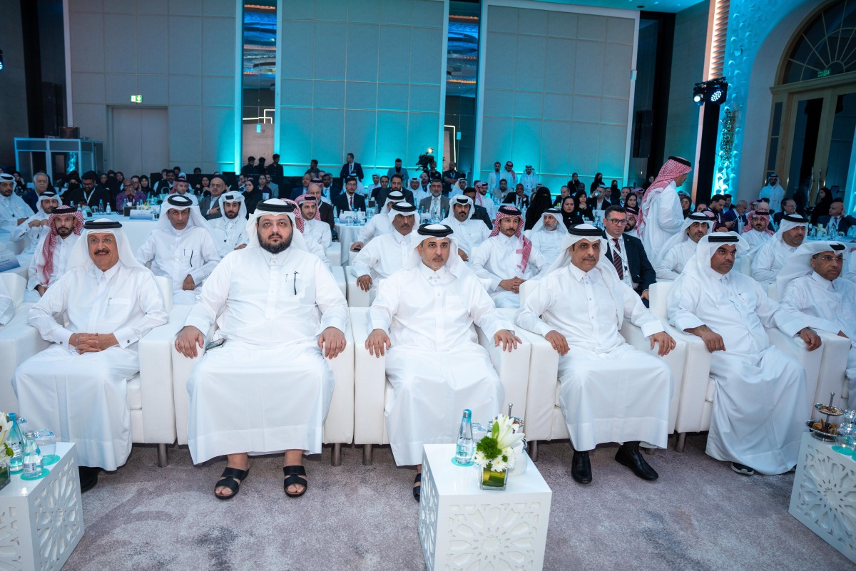 Minister of Environment and Climate Change H E Dr. Abdullah bin Abdulaziz bin Turki Al Subaie with officials and participants during the symposium.