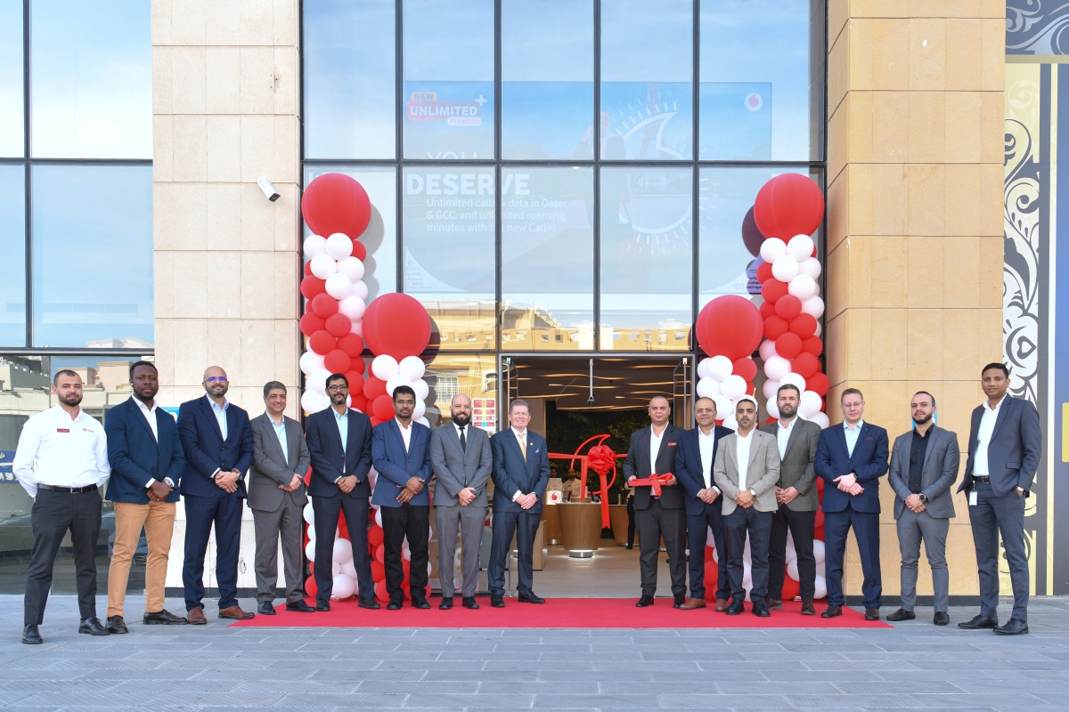 Vodafone Qatar officials during the opening of a new store. 