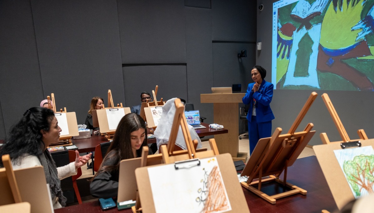 Head of Learning and Outreach at Lawh Wa Qalam, Shameema Simjee and participants during a workshop. 