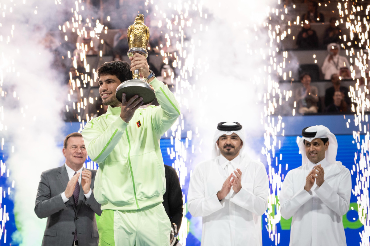 Olympic Council of Asia and Qatar Olympic Committee President H E Sheikh Joaan bin Hamad Al Thani presented the Golden Falcon Trophy to Carlos Alcaraz after the Spaniard won the Qatar ExxonMobil Open, defeating Arthur Fils of France in the final at the Khalifa International Tennis and Squash Complex yesterday. Qatar Tennis Federation President Nasser Al Khelaifi is also present.