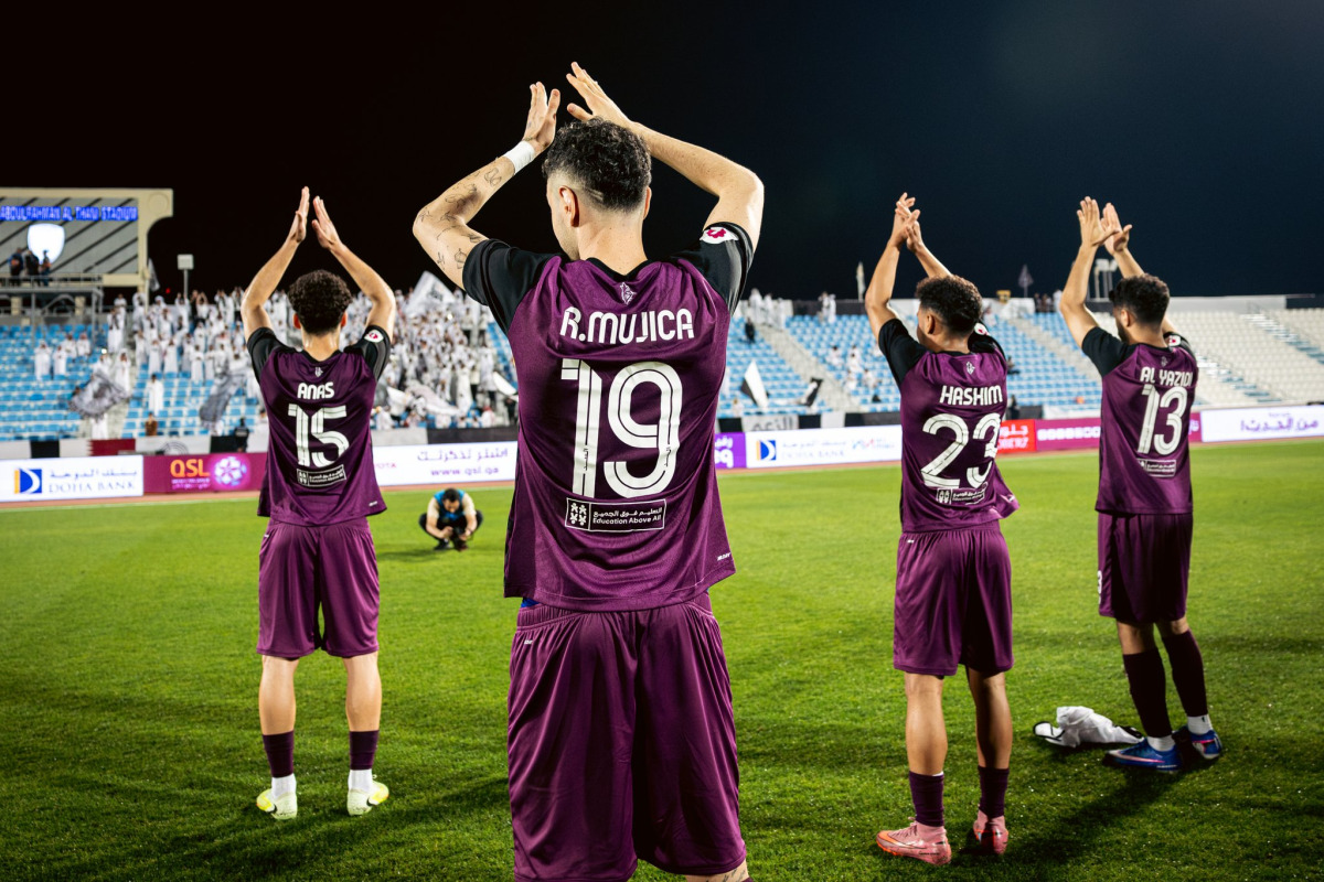 Al Sadd players acknowledge fans after their win over Al Wakrah. 