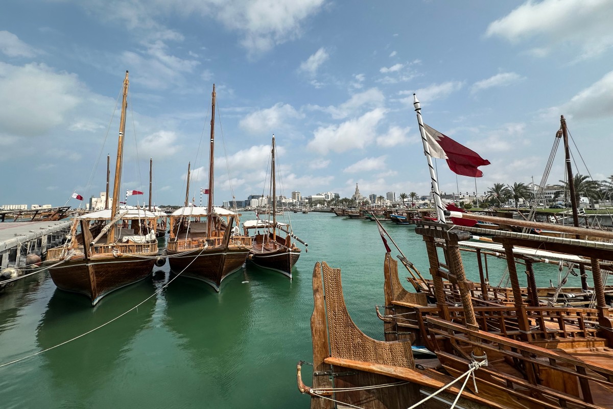 Traditional dhow boats are moored along the corniche in Doha on March 10, 2026. Photo by AFP