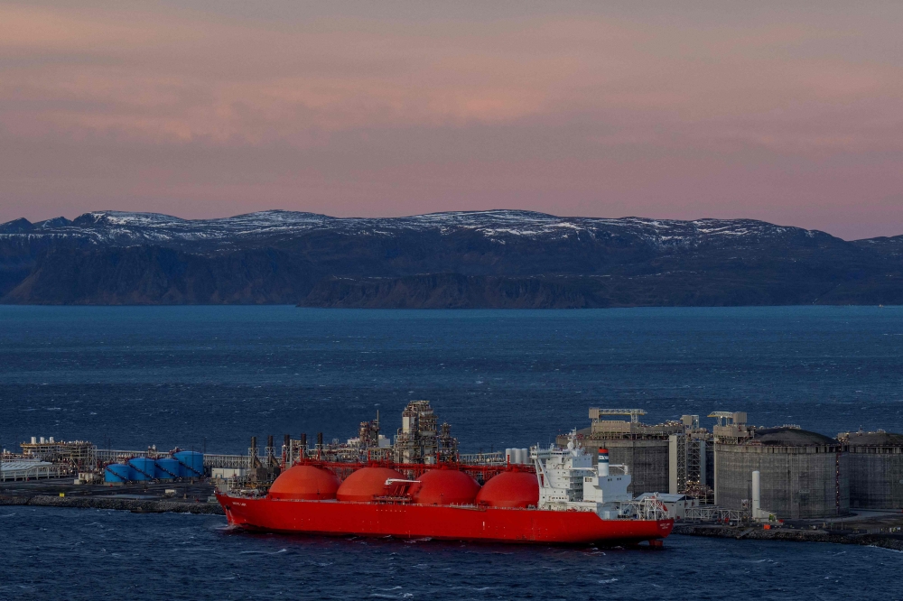 (Files) In this file photo taken on November 2, 2022, a LNG ship is pictured at the island Melkoya. (Photo by Fredrik Varfjell / NTB / AFP)  