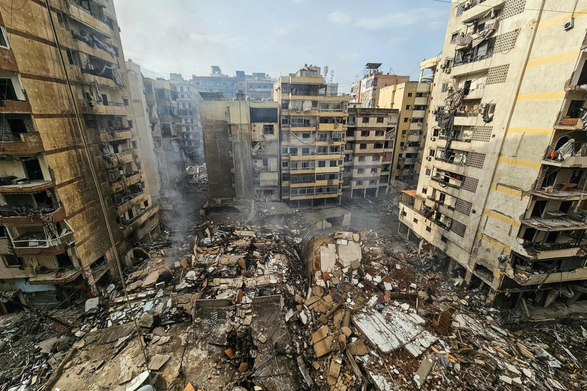  A photograph shows the site of an overnight Israeli airstrike that targeted the Haret Hreik neighbourhood of Beirut's southern suburbs on March 14, 2026.