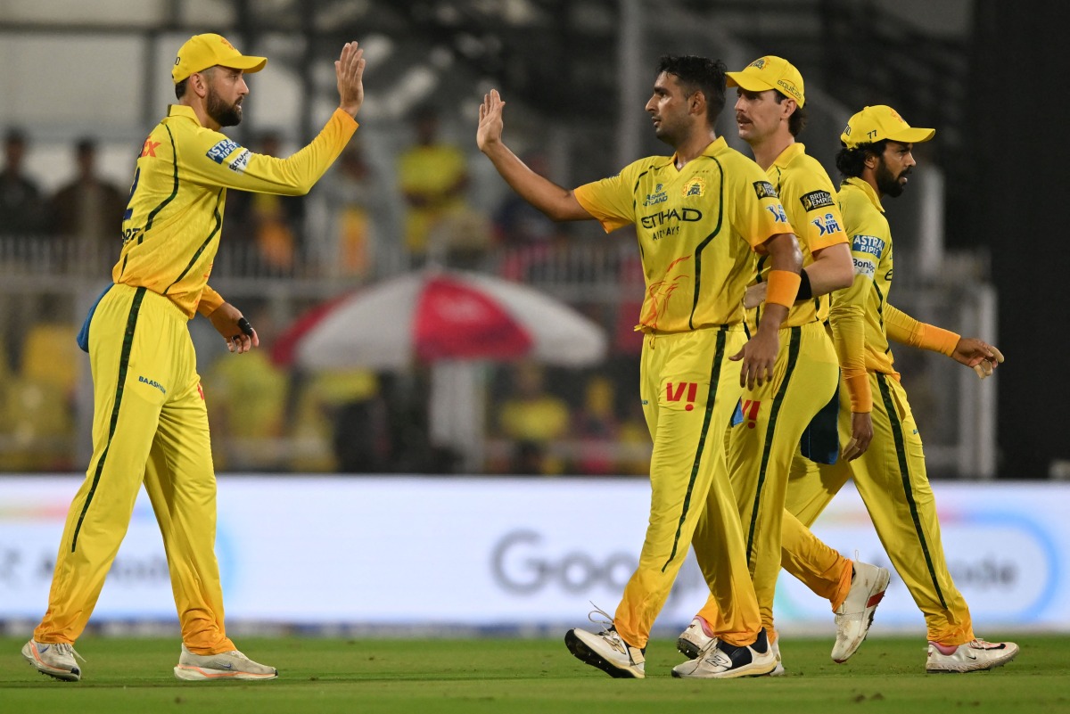 Chennai Super Kings' Indian cricket player Anshul Kamboj (2L) celebrates with teammates after taking the wicket of Rajasthan Royals' Indian player Vaibhav Suryavanshi during the 2026 Indian Premier League (IPL) T20 match between Rajasthan Royals and Chennai Super Kings at the Barsapara Cricket Stadium in Guwahati on March 30, 2026. (Photo by BIJU BORO / AFP) 