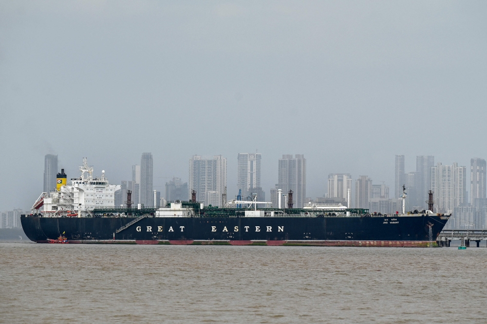 Jag Vasant, an Indian-flagged tanker carrying liquefied petroleum gas (LPG) that transited through the Strait of Hormuz, remains docked at an offloading terminal along the coast in Mumbai on April 1, 2026. (Photo by Punit Paranjpe / AFP)