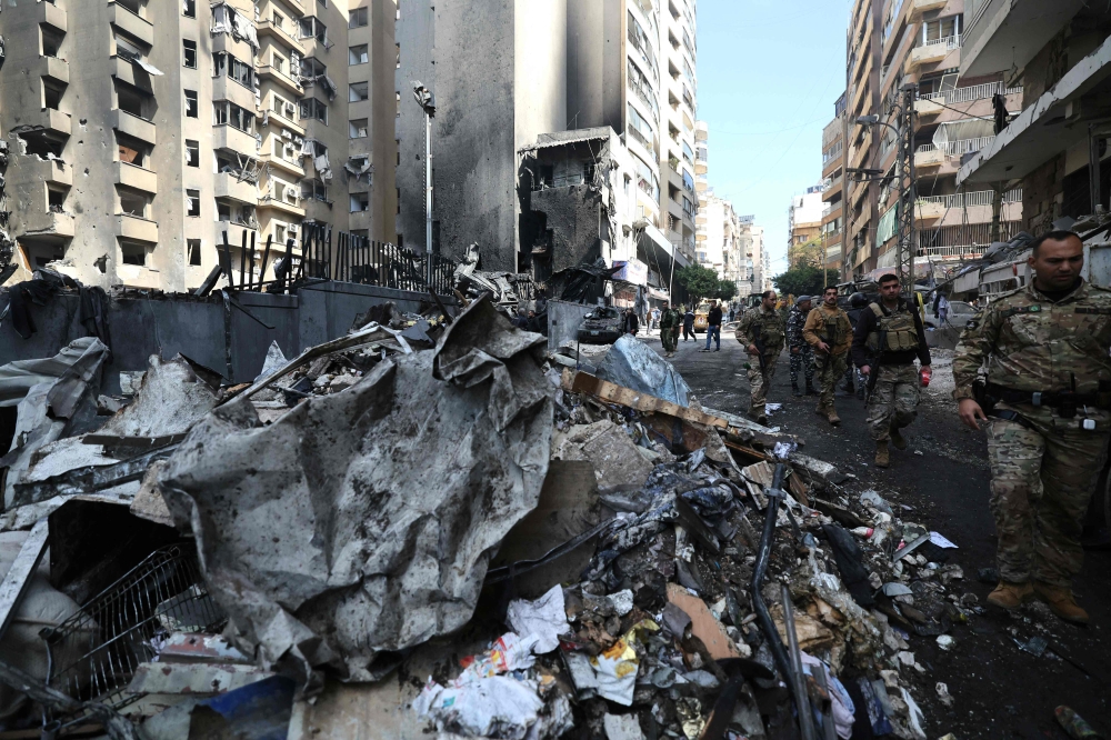 Lebanese army soldiers secure the site of an Israeli airstrike that targeted a building the day before in Beirut's Corniche al-Mazraa neighbourhood on April 9, 2026. (Photo by Ibrahim Amro / AFP)