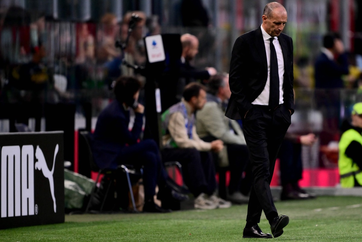 AC Milan's Italian head coach Massimiliano Allegri reacts during the Italian Serie A football match between AC Milan and Udinese at the San Siro stadium in Milan, northern Italy, on April 11, 2026. (Photo by MARCO BERTORELLO / AFP)