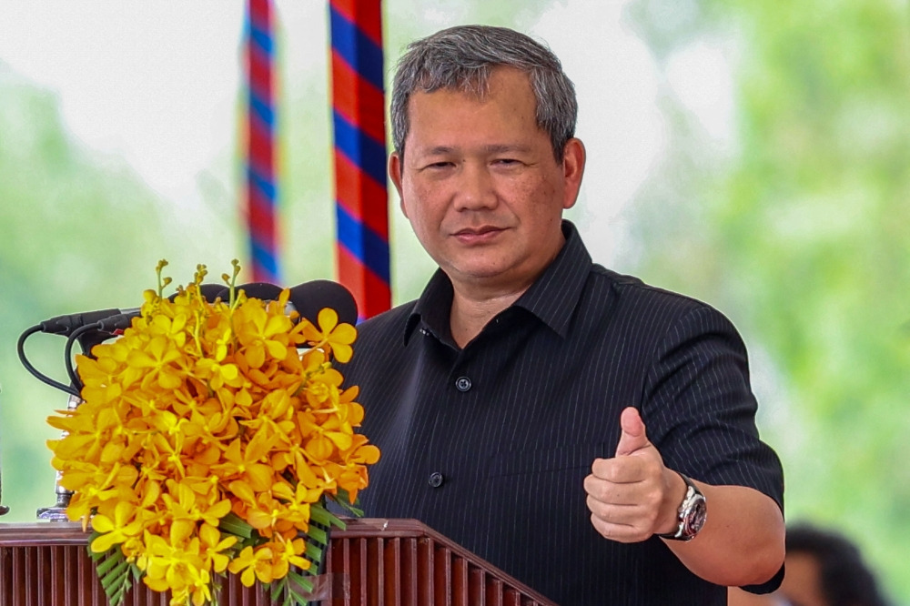 This handout photo taken and released by Agence Kampuchea Press (AKP) on April 11, 2026 shows Cambodia Prime Minister Hun Manet speaking during the groundbreaking ceremony for the construction of the Funan Techo canal project section 2 in Takeo province. (Photo by Handout / Agence Kampuchea Press (AKP) / AFP)