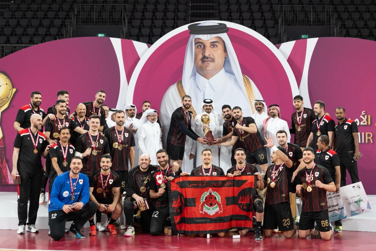 Olympic Council of Asia and Qatar Olympic Committee President H E Sheikh Joaan bin Hamad Al Thani presents the Amir Cup champions' trophy to Al Rayyan.
