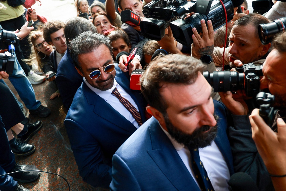 Argentine football legend Diego Maradona's former medical doctor Leopoldo Luque arrives at courthouse for a preliminary hearing in a trial over his death in San Isidro, outskirts of Buenos Aires on April 14, 2026. (Photo by Tomas CUESTA / AFP)