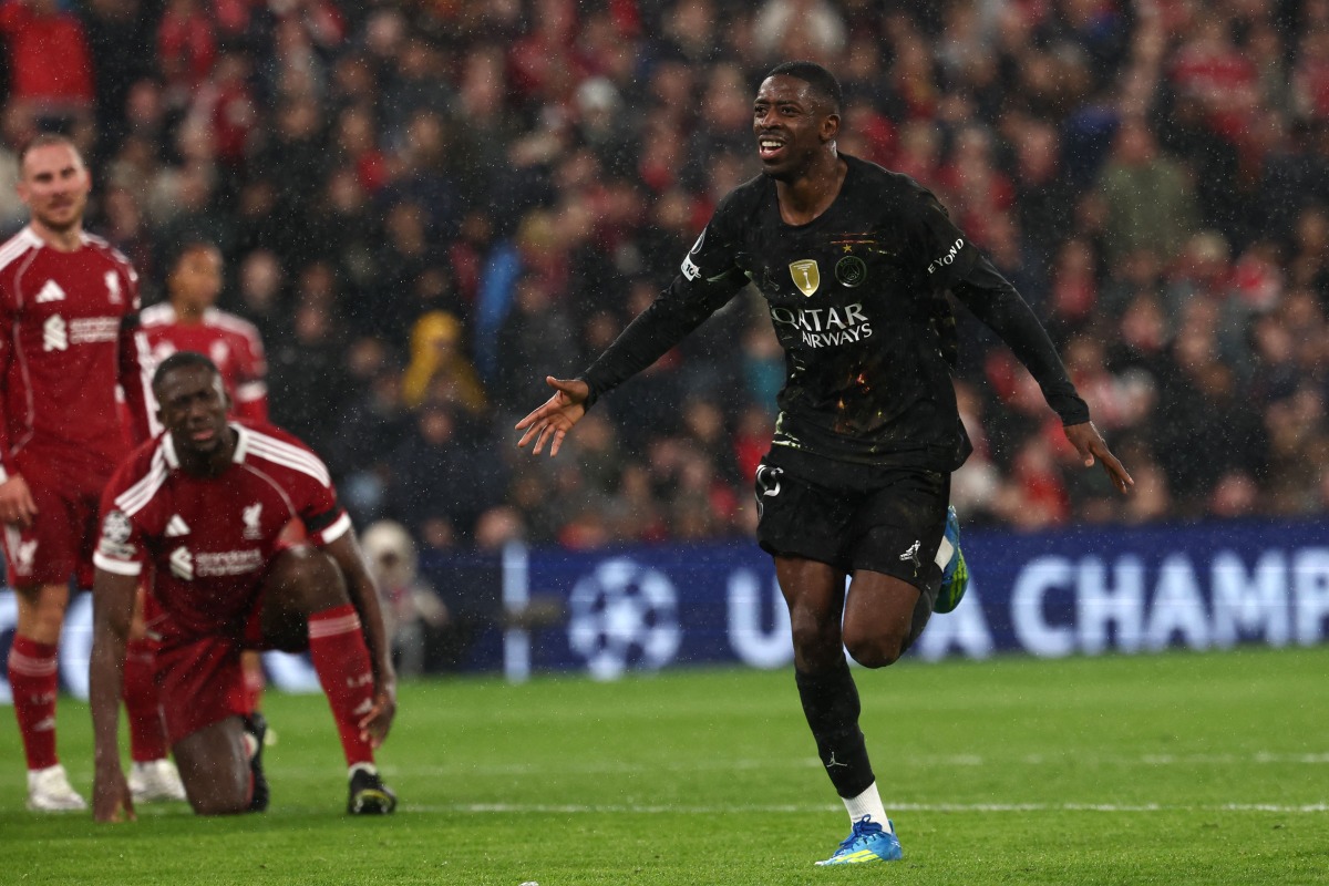 Paris Saint-Germain's French forward #10 Ousmane Dembele celebrates scoring his team's first goal during the UEFA Champions League quarter final, second-leg football match between Liverpool and Paris Saint-Germain at Anfield in Liverpool, north west England on April 14, 2026. (Photo by FRANCK FIFE / AFP)