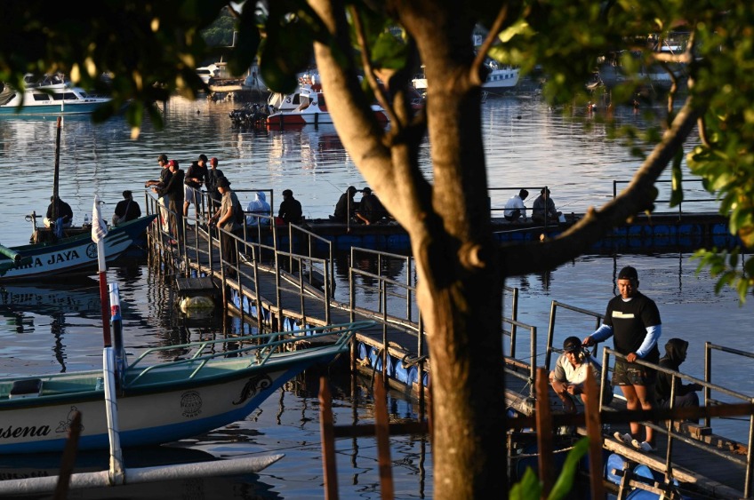 People fishing at a pier on Indonesia's resort island of Bali. AFP file photo for representational purposes only.