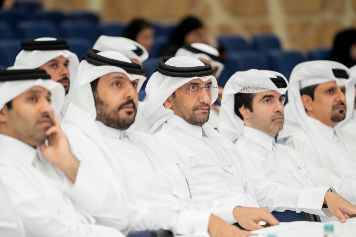 Minister of Justice and Minister of State for Cabinet Affairs H E Ibrahim bin Ali Al Mohannadi (centre) and other officials during the honouring ceremony.