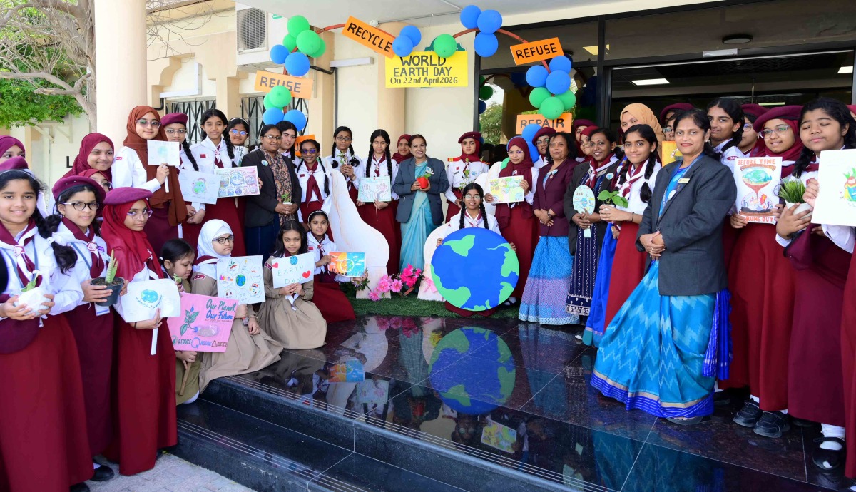  Principal MES Indian School Dr Hameeda Kadar with students and teachers during the event.