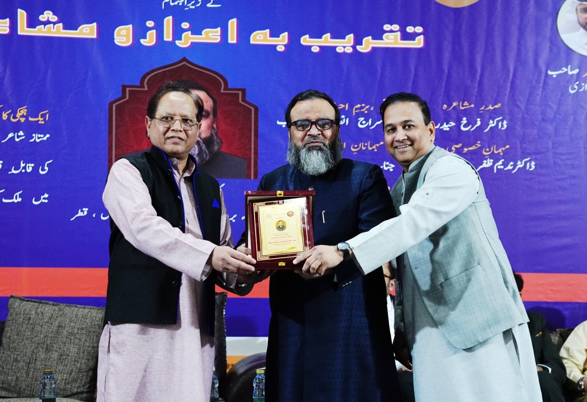 Poet Nadeem Maher being honoured at the event.
