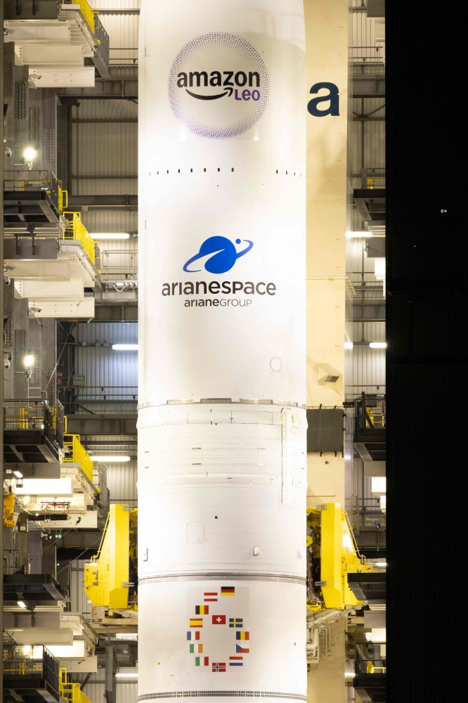 FRANCE-OVERSEAS-GUIANA-SPACE
This photograph shows a view of the Arianespace's Ariane 6 rocket carrying the Amazon Leo LE-02 payload ahead of its launching as part of Flight VA268, at the Guiana Space Centre in Kourou, on the French overseas department of Guiana on April 30, 2026. (Photo by RONAN LIETAR / AFP)
