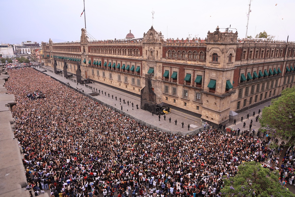 Handout picture released by Mexico's presidency press office showing fans of South Korea's K-pop band BTS in front of the Palacio Nacional in Mexico City on May 6, 2026. Photo by HANDOUT / MEXICO'S PRESIDENCY PRESS OFFICE / AFP