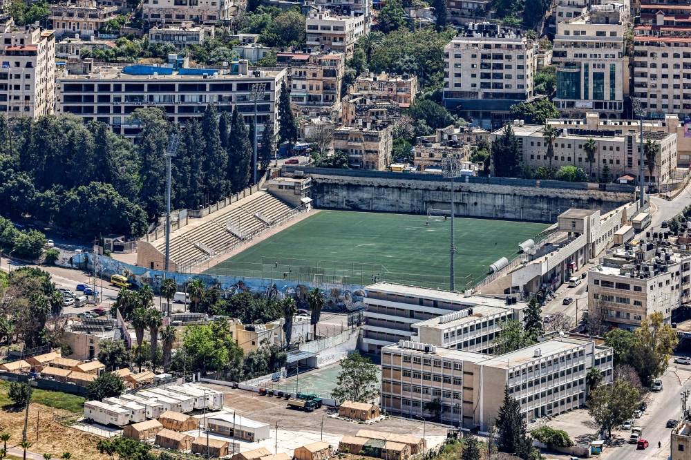 Nablus Football Stadium is pictured in the centre of the city of Nablus in the occupied West Bank on May 7, 2026. (Photo by Zain JAAFAR / AFP)
