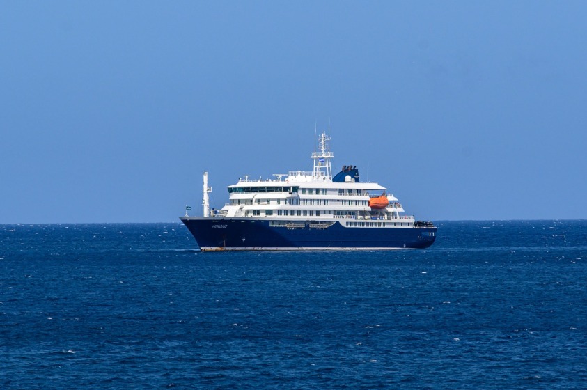 A general view of the cruise ship MV Hondius stationary off the port of Praia, the capital of Cape Verde, on May 3, 2025. Photo by AFP