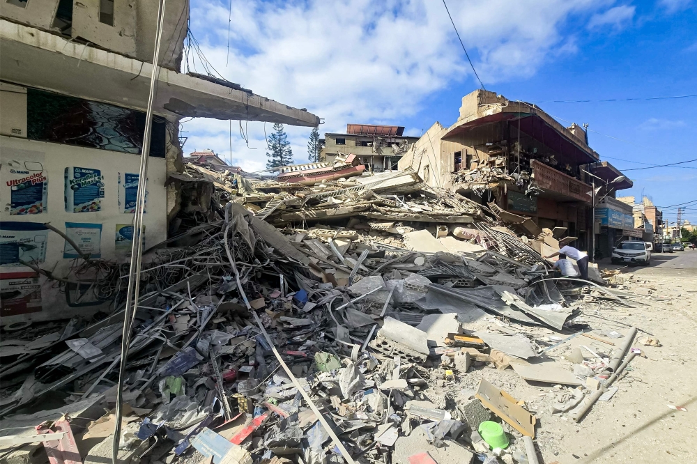 The rubble of a collapsed building is pictured following overnight Israeli bombardment on Lebanon's southern city of Tyre on May 16, 2026.
 (Photo by Kawnat Haju / AFP)