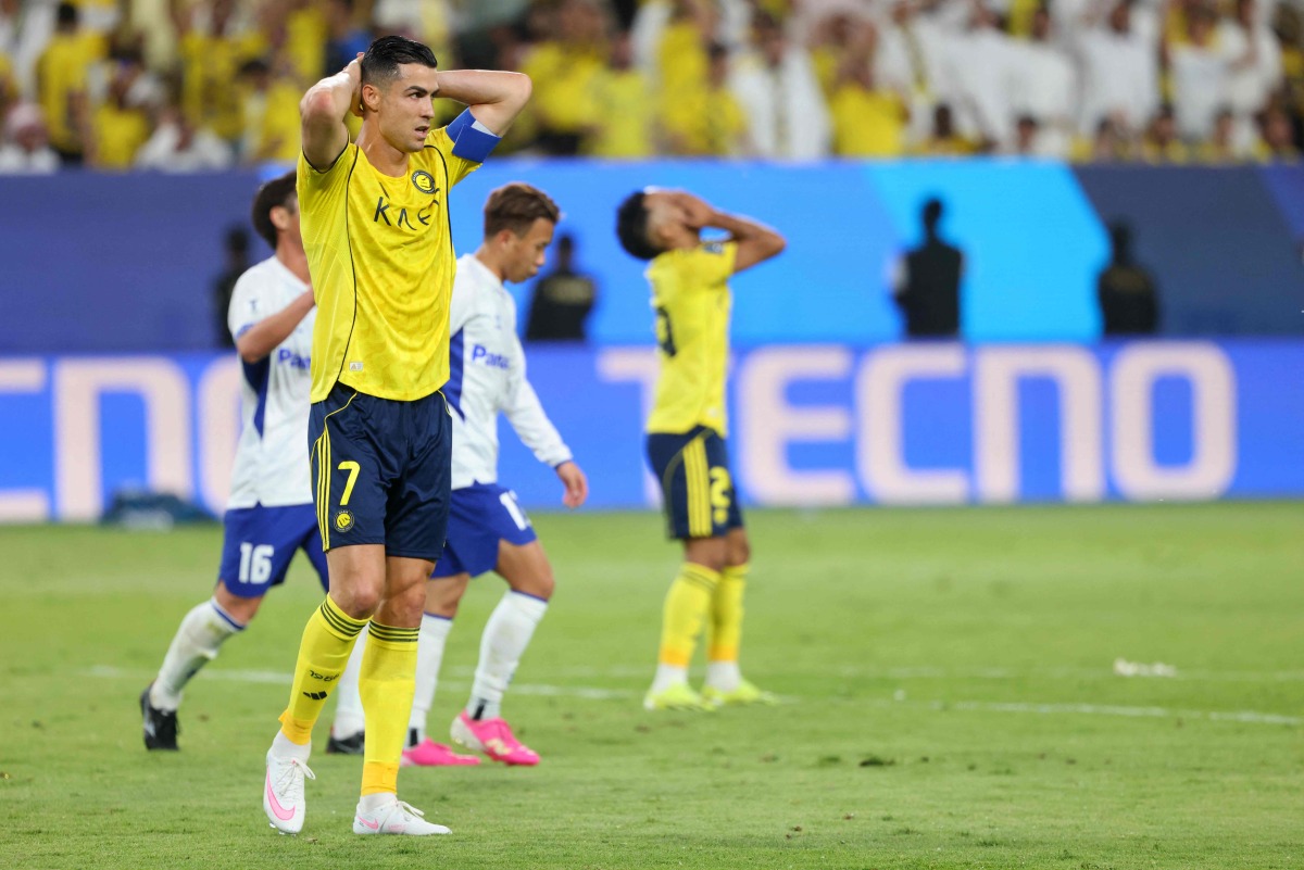 Al Nassr's Portuguese forward #07 Cristiano Ronaldo reacts during the 2026 AFC Champions League Two final football match between Al-Nassr and Gamba Osaka at the Al-Awwal Park Stadium in Riyadh on May 16, 2026. (Photo by Fayez NURELDINE / AFP)
