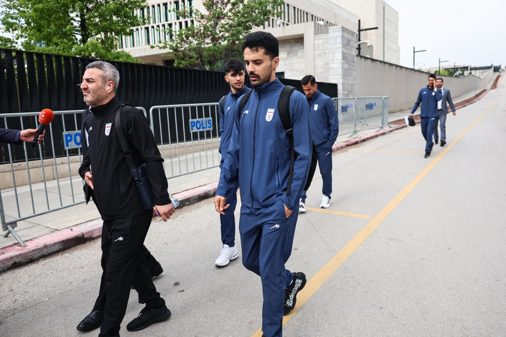 Some Iranian national football team players and members of their delegation arrive at the US Embassy in Ankara for their visa application ahead of the 2026 FIFA World Cup, (Photo by Adem Altan / AFP)