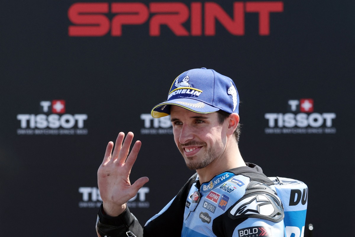 Team Gresini Racing MotoGP's Alex Marquez celebrates winning the Sprint Race at the Catalunya Moto GP Grand Prix at the Catalunya racetrack in Montmelo, near Barcelona, on May 16, 2026. (Photo by Lluis GENE / AFP)
