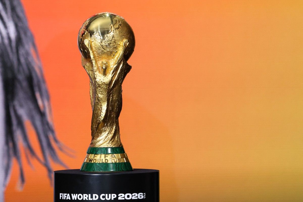 The 2026 FIFA World Cup winner's trophy is seen on stage at the 2026 World Cup halftime show announcement in New York City on May 14, 2026. (Photo by Charly Triballeau / AFP)
