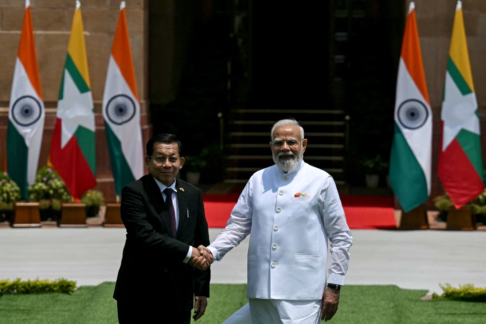 India's Prime Minister Narendra Modi (R) shakes hands with Myanmar's President Min Aung Hlaing before their meeting at the Hyderabad House in New Delhi on June 1, 2026. (Photo by Arun Sankar / AFP)