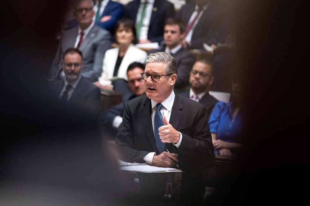 This handout photograph taken and released by the UK Parliament's House of Commons on June 3, 2026 shows Britain's Prime Minister Keir Starmer speaking during the weekly session of Prime Minister's Questions (PMQs). (Photo by Handout / House of Commons / AFP) 