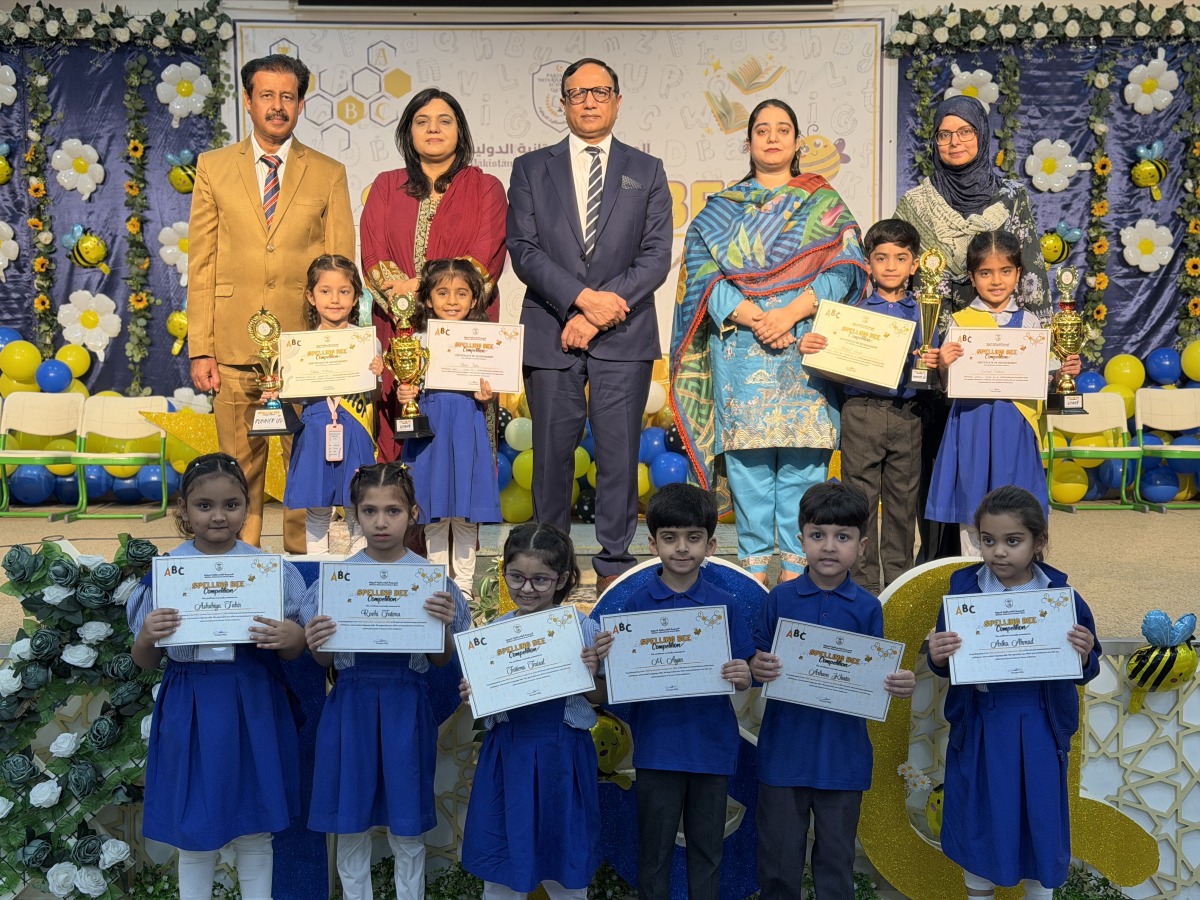 Principal PISQ Ch. Muhammad Afzal with officials and students during the event.