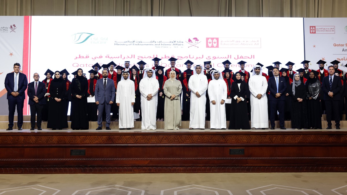 Minister of Education and Higher Education H E Lolwah bint Rashid bin Mohammed Al Khater and other officials with Qatar Scholarships Programme graduates. PIC: Rajan Vadakkemuriyil / The Peninsula