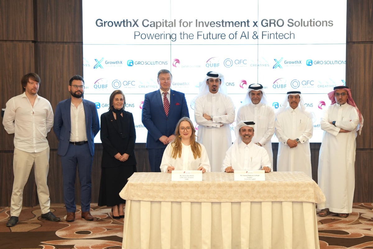 Ambassador of Ukraine to Qatar H E Andrii Kuzmenko and QC Board Member Mohamed bin Ahmed Al Obaidli with other officials witnessing the signing by Chairman of GrowthX Capital Hamad Mubarak Al Hajri and President of Grow Solutions Maria Shevchenko.