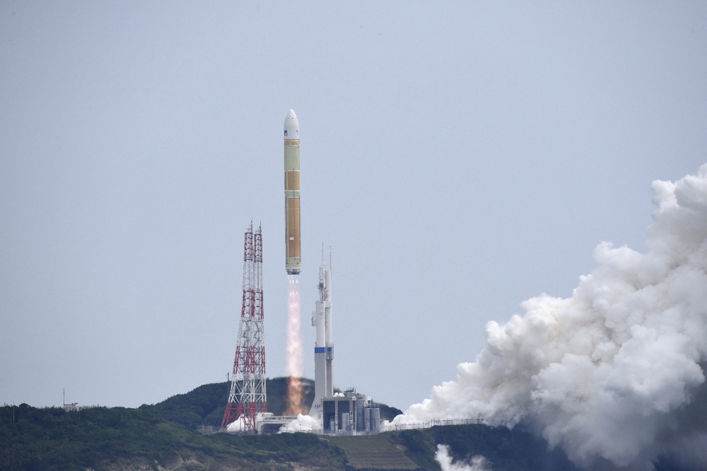 The H3 rocket No. 6 is launched at Tanegashima Space Center in Kagoshima Prefecture on June 12, 2026. (Photo by JIJI PRESS / AFP)